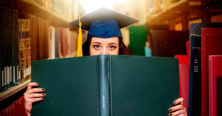high IQ teens are liked more by their peers - hig school graduate holding diploma