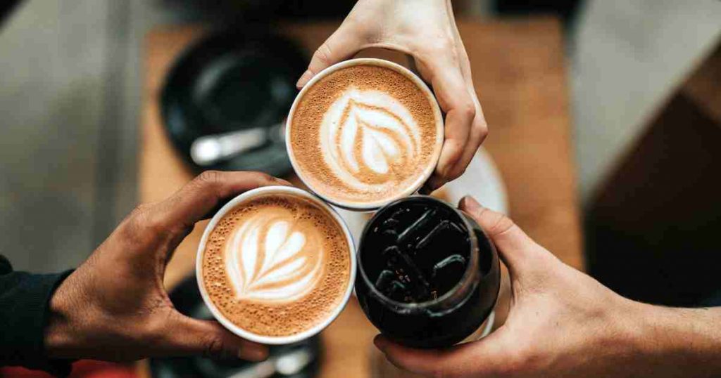 coffee preference study - three hands drinking coffee
