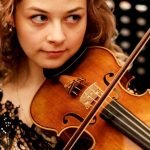 violing making and AI - woman playing violin