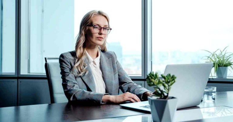 decision fatigue - female bank manager at desk