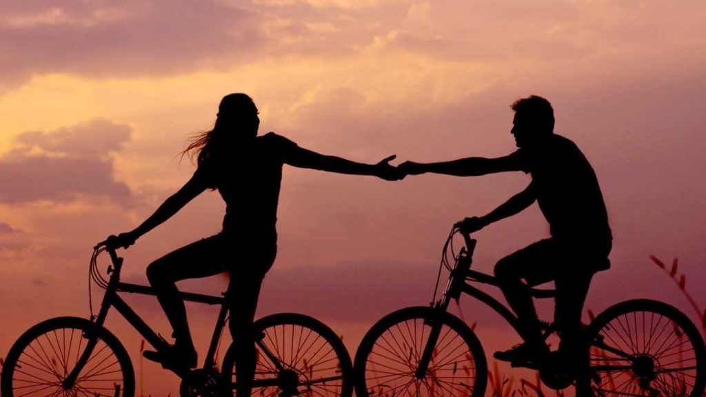 Dating someone with Borderline Personality Disorder - two people on bikes in sunset