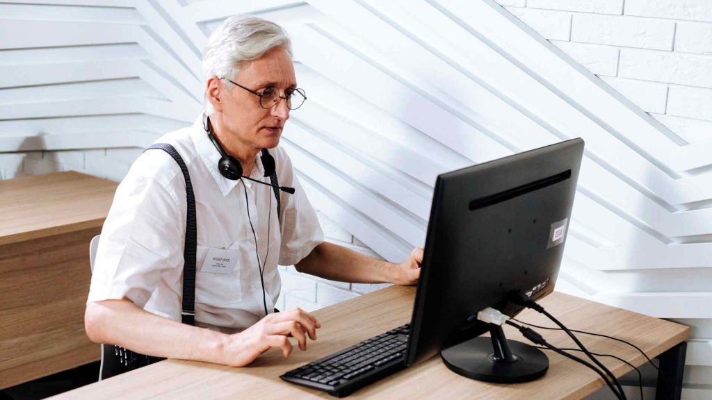 older workers get fewer job offers on linkedin - senior using computer