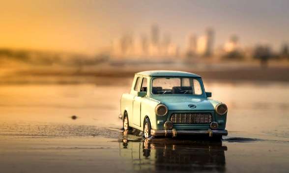 dream of driving into water - car on beach