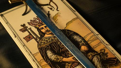 mighty king of swords card in tarot deck